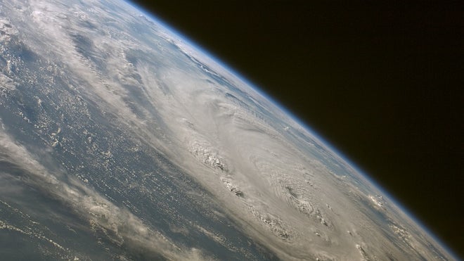 A Hurricane as Seen From Higher Climbs